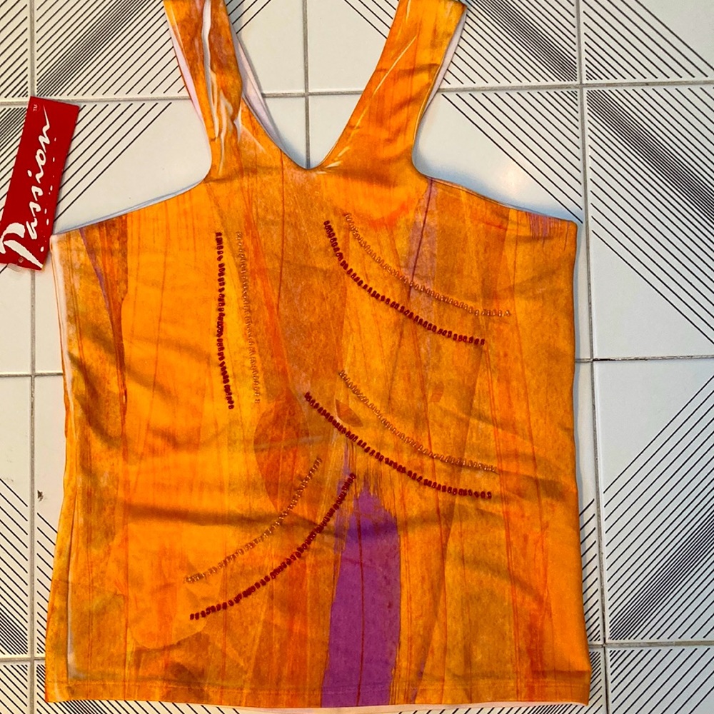 Cold shoulder top with beading. Stretchy and comfortable. New Low Price!